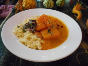 Pumpkin ragout with small homemade dumplings